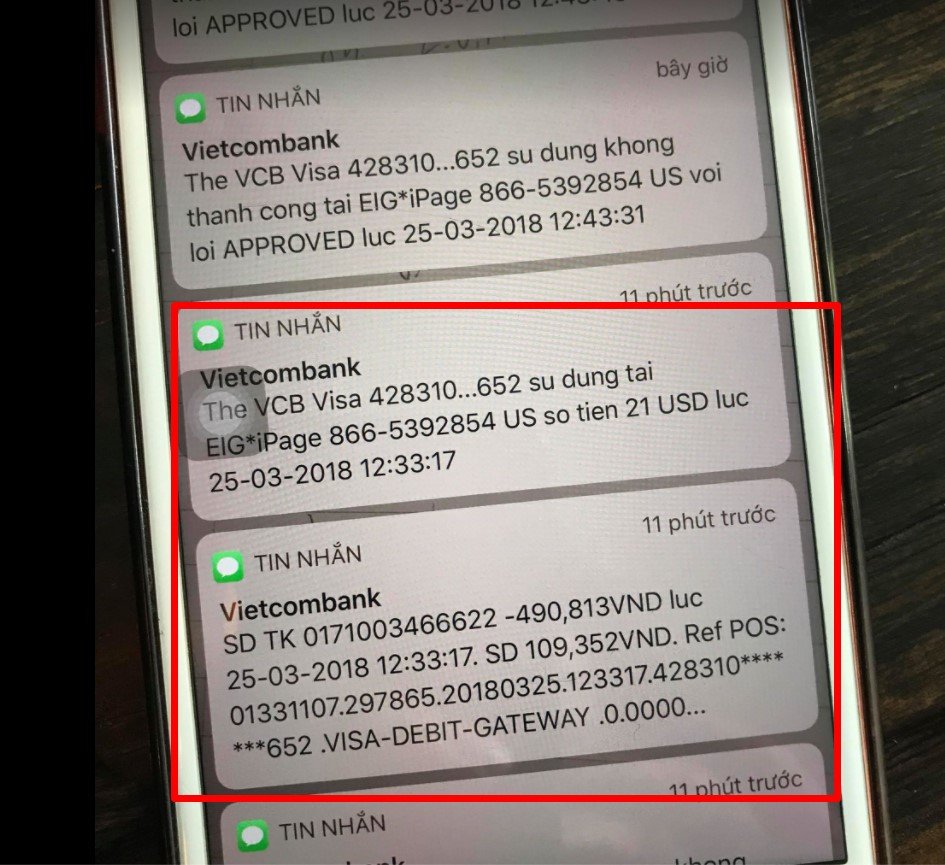 Đây là tin nhắn trừ tiền trên Vietcombank. Tỉ giá + phí chuyển đổi thì ra tầm 23.3k/USD